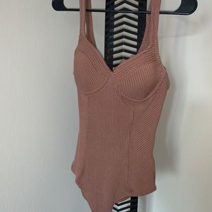 NEW Bodysuit with a tag attached